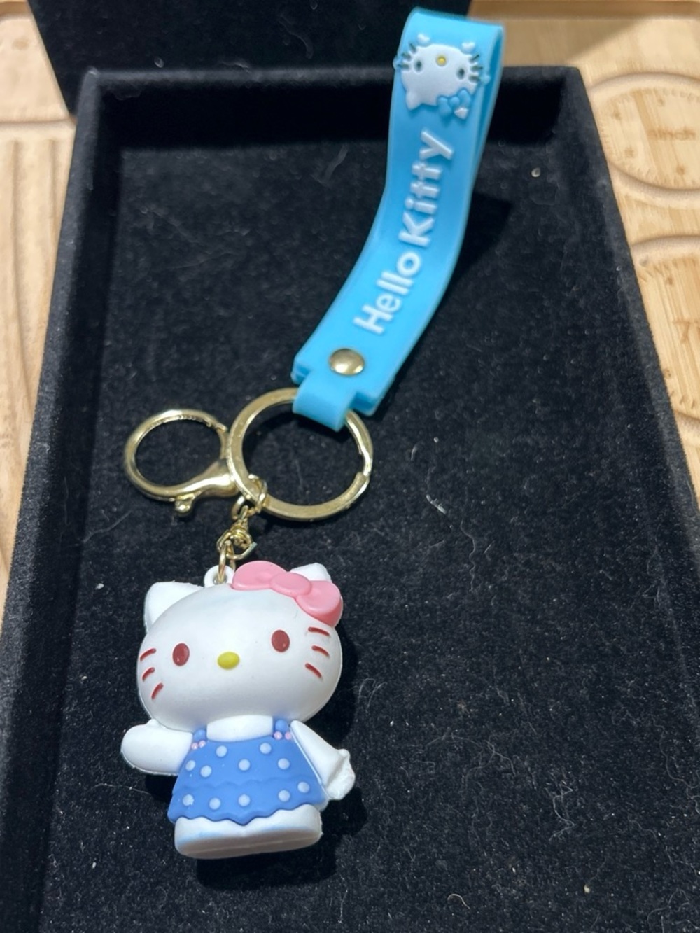 Hello Kitty Blue Strap Keychain with White Cat Charm